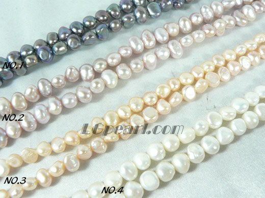pink, white, peacock blue and purple nugget pearl strand of 6-7mm
