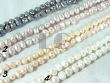 pink, white, peacock blue and purple nugget pearl strand of 6-7mm