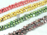 red, gold, peacock green, coffee nugget pearl strand of 6-7mm