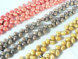 red, gold and coffee freshwater wheat pearl strand of 6-7mm