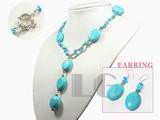 14*18mm oval blue turquoise set with 4mm topaz beads
