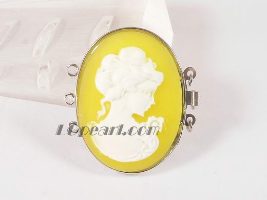 three strands yellow oval resin necklace clasp with a head statue